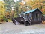 A rental cabin with a wheelchair ramp at JELLYSTONE PARK ™ AT BIRCHWOOD ACRES - thumbnail