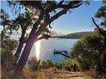 Person fishing off pier in the distance at CACHUMA LAKE CAMPGROUND - thumbnail