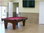 Pool table in game room at FLORIDA PINES MOBILE HOME & RV PARK - thumbnail