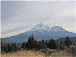 A view of the mountain with snow nearby at THE PARKWAY RV RESORT & CAMPGROUND - thumbnail