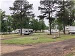 Some empty and occupied dirt sites at MORRILTON I40/107 RV PARK - thumbnail