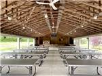 The picnic benches in the pavilion at OAK HAVEN FAMILY CAMPGROUND - thumbnail