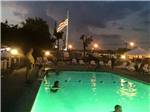 Swimming pool at night at TWO RIVERS CAMPGROUND - thumbnail