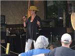 Lady singing at TWO RIVERS CAMPGROUND - thumbnail