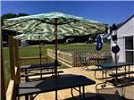 The patio with covered seating at MEADOWBROOK CAMPING AREA - thumbnail