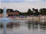 Water with fountain and people on beach at OCEAN VIEW RESORT CAMPGROUND - thumbnail