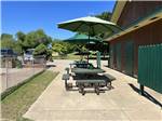 A set of covered patio tables at LANSING COTTONWOOD CAMPGROUND - thumbnail
