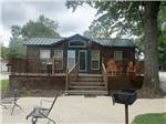 One of the cabin rentals with a deck at TERRE HAUTE CAMPGROUND - thumbnail