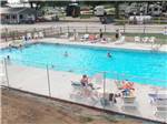 People around the swimming pool at DOUBLE J CAMPGROUND - thumbnail