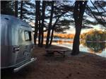 Airstream trailer in a waterfront site at WASSAMKI SPRINGS CAMPGROUND - thumbnail