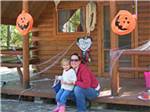 Mother and child enjoying Halloween at ATLANTIC SHORE PINES CAMPGROUND - thumbnail