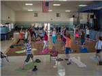 People exercising in a group class at FOUNTAIN OF YOUTH SPA RV RESORT - thumbnail