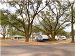Several travel trailers parked at I-10 KAMPGROUND - thumbnail