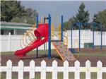 Playground with swing set at JANTZEN BEACH RV PARK - thumbnail