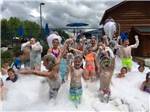 Kids playing in a bubble party at STONEY CREEK RV RESORT - thumbnail