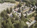 An aerial view of the wooded campsites at HARMONY LAKESIDE RV PARK & DELUXE CABINS - thumbnail