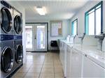 Laundry room with washer and dryers at PADRE PALMS RV PARK - thumbnail
