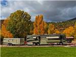 A large pull thru RV campsite at ALPEN ROSE RV PARK - thumbnail