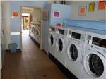 A line of front loading washing machines at ALPEN ROSE RV PARK - thumbnail