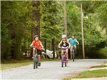 Kids riding bicycles through the campground at TALLAHASSEE EAST CAMPGROUND - thumbnail