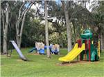 The playground equipment at SUGAR MILL RUINS TRAVEL PARK - thumbnail