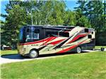 A large motorhome in a RV site at BIG CEDAR CAMPGROUND & CANOE LIVERY - thumbnail