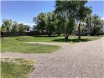 A row of back in gravel RV sites at BEAVERHEAD RIVER RV PARK & CAMPGROUND - thumbnail