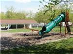 Playground with slide next to the pavilion at ROUND TOP CAMPGROUND - thumbnail