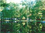 Beautiful view of campground reflected in water at CHEROKEE PARK CAMPGROUND - thumbnail