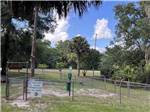 The fenced in pet area at LUNA SANDS RV RESORT - thumbnail