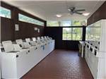 The washer and dryers in the laundry room at LUNA SANDS RV RESORT - thumbnail