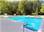 The fenced in outdoor pool at OTTER LAKE CAMP RESORT - thumbnail
