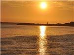 Sunset view on the water at NETARTS BAY GARDEN RV RESORT - thumbnail