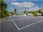 Tennis court next to the manufactured homes at NORTHTIDE NAPLES RV RESORT - thumbnail