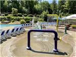 The splash pad next to the swimming pool at PINE ACRES FAMILY CAMPING RESORT - thumbnail