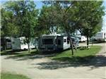 Multiple RVs parked onsite at GRAND FORKS CAMPGROUND - thumbnail