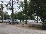 A row of gravel RV sites at BOOTHEEL RV PARK & EVENT CENTER - thumbnail