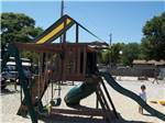 The playground equipment at APACHE FAMILY CAMPGROUND & PIER - thumbnail