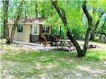 A cabin in the woods at BIG OAKS FAMILY CAMPGROUND - thumbnail