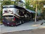 A motorhome in a gravel RV site at MUSICLAND KAMPGROUND - thumbnail