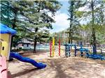 Slide and colorful play structures at BUFFALO LAKE CAMPING RESORT - thumbnail