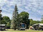 Multiple RVs parked on-site at LONG ISLAND BRIDGE CAMPGROUND - thumbnail