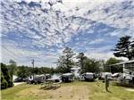 Open area with multiple RVs at LONG ISLAND BRIDGE CAMPGROUND - thumbnail
