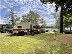 Trailer parked at campsite at LONG ISLAND BRIDGE CAMPGROUND - thumbnail