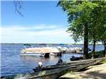 Boats docked on the lake at FREMONT RV CAMPGROUND - thumbnail
