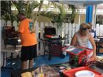 Outdoor cooking at PARADISE ISLAND RV RESORT - thumbnail