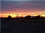 Beautiful sunset at dusk at HIGH PLAINS CAMPING - thumbnail
