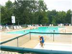 People swimming in the pool at TWIN MILLS CAMPING RESORT - thumbnail
