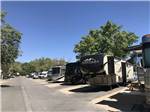 Angular view of campers in campsites at HIGHLANDS RV PARK - thumbnail