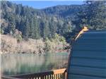 A rental cabin overlooking the water at ATRIVERS EDGE RV RESORT - thumbnail